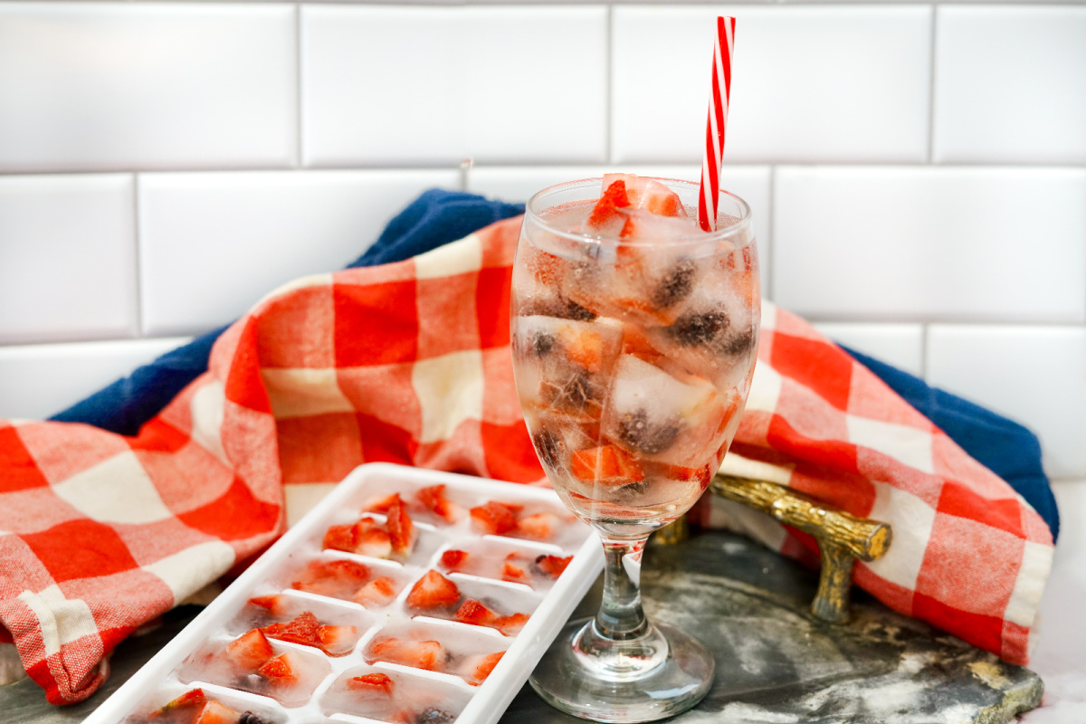 Summer berry ice cubes in a drink